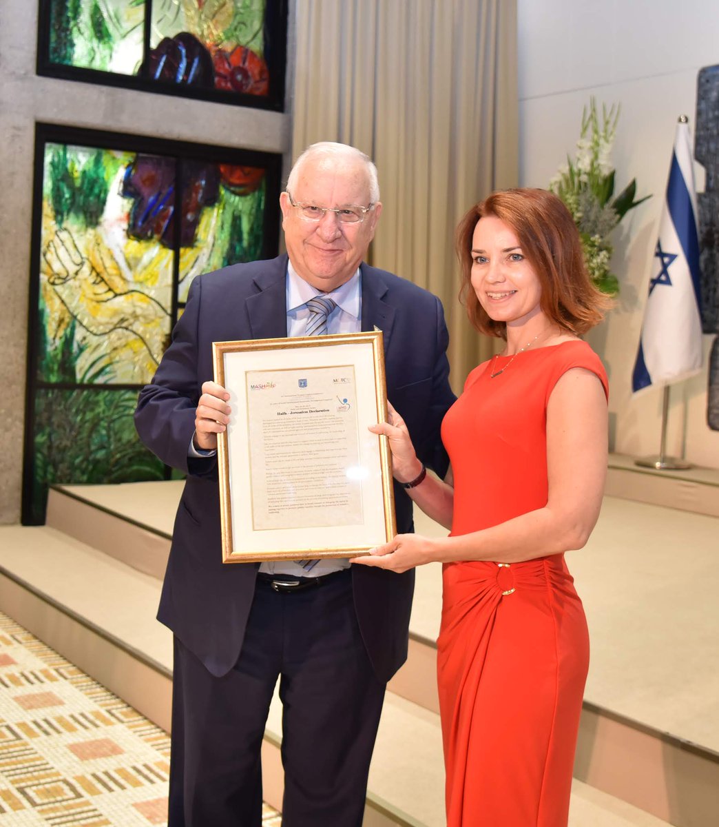 MASHAVisrael's tweet photo. Presidential reception: Israel’s President Reuven Rivlin hosted the participants of the 30th International Women Leaders Conference, who presented him with the ‘Conference Declaration’. Head of MASHAV @GilHaskel was honored to give @PresidentRuvi the #MASHAV60 Anniversary Book https://t.co/itHiwVZx6X