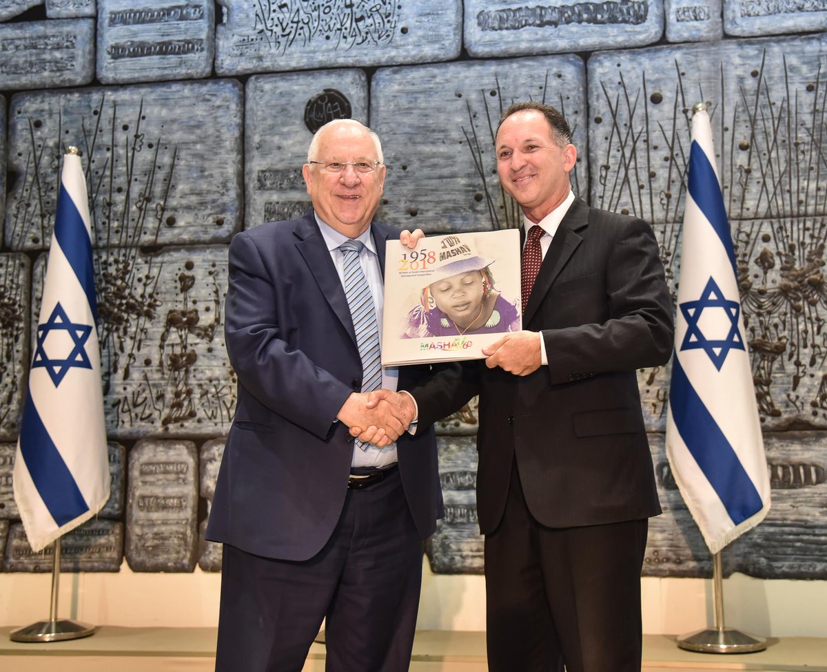 MASHAVisrael's tweet photo. Presidential reception: Israel’s President Reuven Rivlin hosted the participants of the 30th International Women Leaders Conference, who presented him with the ‘Conference Declaration’. Head of MASHAV @GilHaskel was honored to give @PresidentRuvi the #MASHAV60 Anniversary Book https://t.co/itHiwVZx6X
