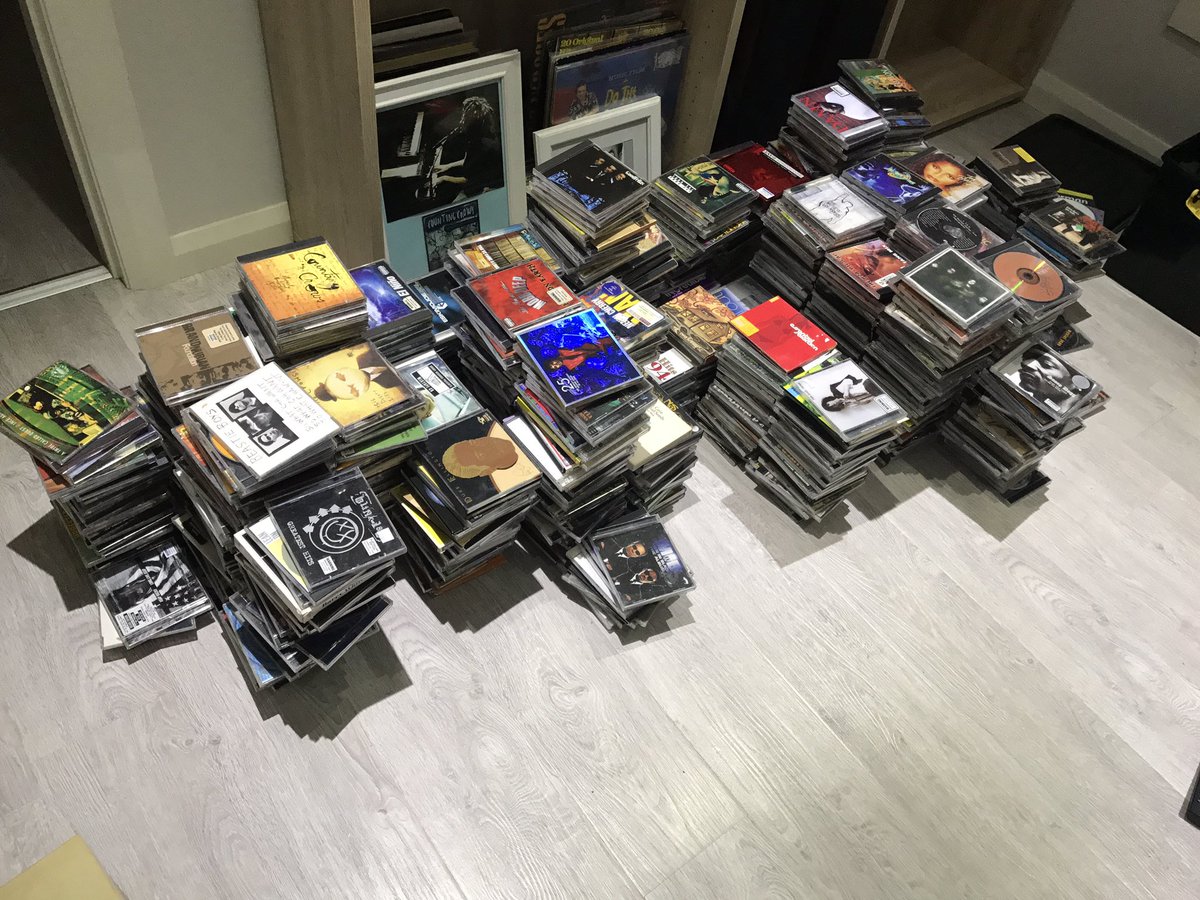 MarsHollygarden's tweet photo. I miss that little pause that came with the slide of a CD tray as it was the calm before the storm. I love the physicality of old music mediums - being able to "own"your favourite record instead of streaming it. Playing it uninterrupted from front to back was the truth #mystacks https://t.co/P1WE7acnaa