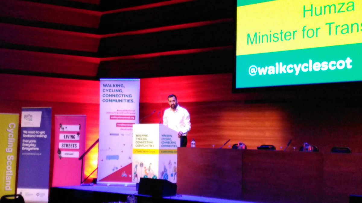 CyclingUKScot's tweet photo. Minister for Transport and the Islands @HumzaYousaf speaking to the packed @walkcyclescot about initiatives funded through the doubling of the active travel budget #ActiveScot https://t.co/Cz2dc0U6p0
