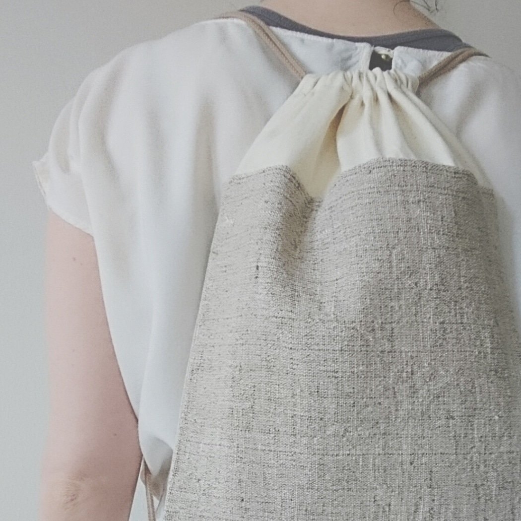 Mari_and_Oli's tweet image. The first item I ever made to sell and it's still my favorite. The material is amazing, like nature in the form of a backpack. This design has a pocket inside ☺️ #drawstringbackpack #ethicalfashion #sustainablefashion #slowfashion #madebyhand #ethicalliving #zerowaste
