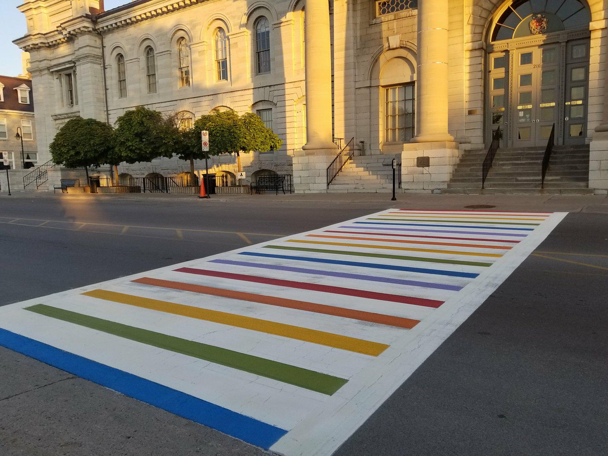 HUGE props to <a href="/cityofkingston/">City of Kingston - Municipal Government</a> for painting the crosswalk at City Hall in honour of #PrideMonth which kicks off Friday! #ygk