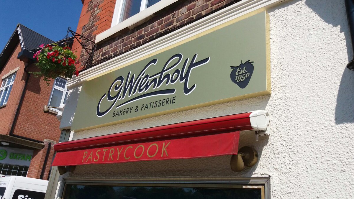 SignsManchester's tweet photo. Our latest project for @Gwienholt Bakery in Alderley Edge. Two fret cut gold composite trays backed out in DAY/NIGHT acrylic, meaning that at night the black information will all illuminate white by an internal LED light sheet. #signsnow #signscheshire #alderleyedge #gwienholt https://t.co/sB8JLW7f6c