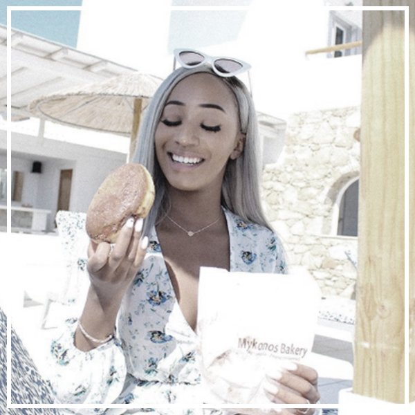 Sarah Diallo enjoying donuts sporting our gorgeous engraved disc pendant 🍩 Shop it: bit.ly/2sw5qqa #KaytieWu