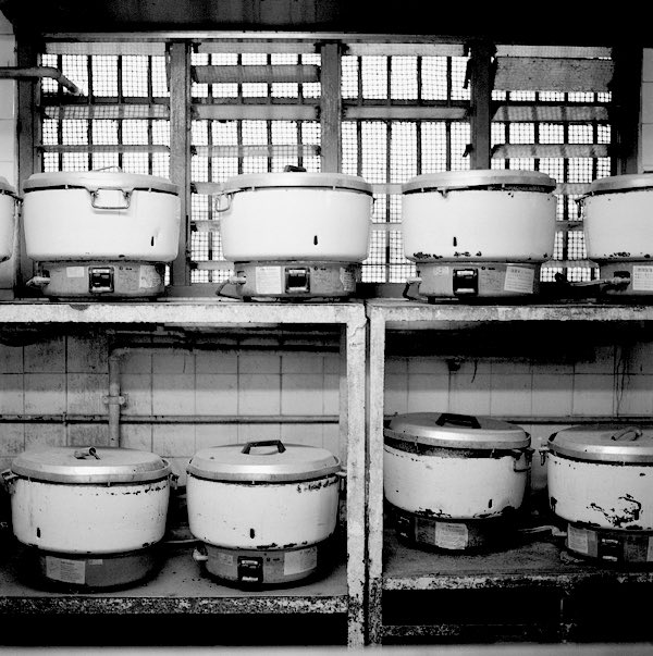 JoFarrellPhoto's tweet photo. Rice cookers, Victoria Prison kitchen HK - from a series I took in 2007 #taikwun #blackandwhitephotographer #hongkong #prisonkitchen #derelict https://t.co/shmi4PNhlF