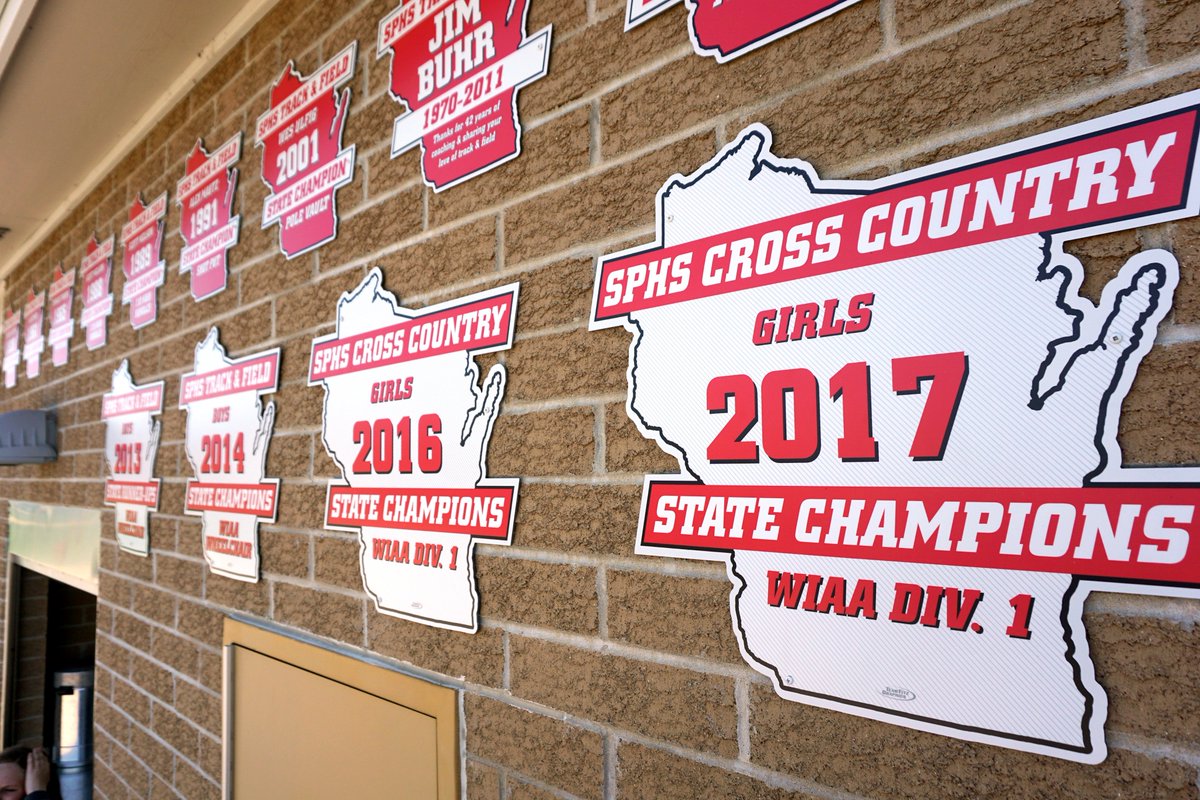 Team_Fitz's tweet photo. The new team state championship signs are on display under @sunprairiek12 impressive number of individual state titles. Looking good—thanks for the pic @SPTFCoach! #CardinalPride #FastBirds @SPCardinals @sppolevault https://t.co/fZtPJblE9F