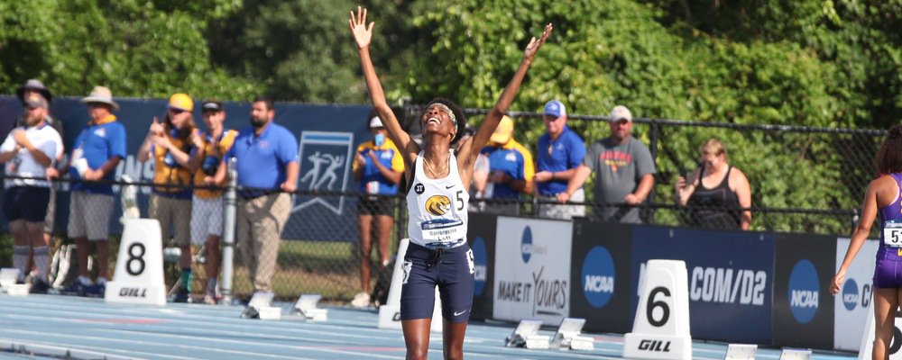 NCAADII's tweet photo. Despite a DQ that scratched Coker senior Darroneshia Lott's #D2TF national title and record, Ursuline junior Janelle Perry stepped up and gifted her own national champion trophy to Lott: https://t.co/vFHlVXPcnZ. #MakeItYours https://t.co/qMfdVMOn9m