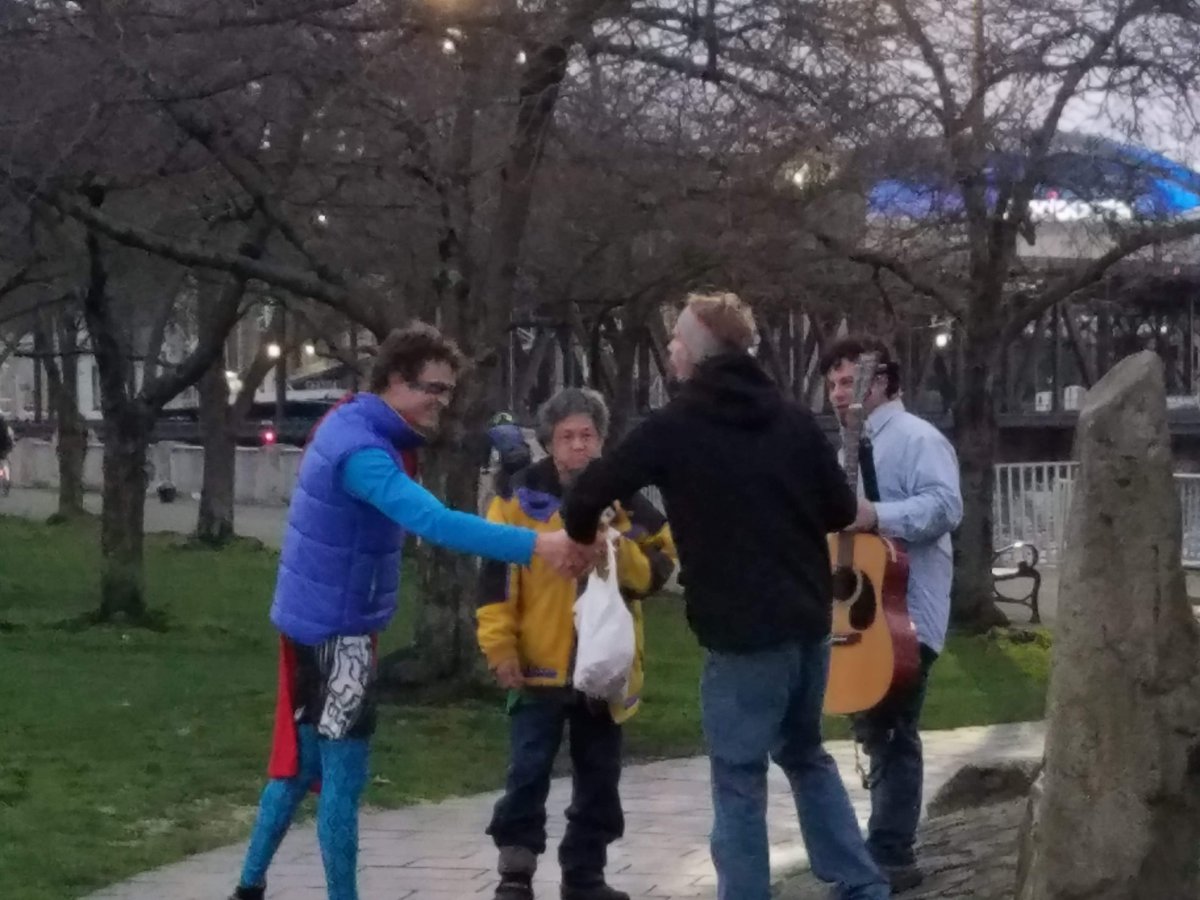 Handing out cheeseburgers to these homeless gentleman