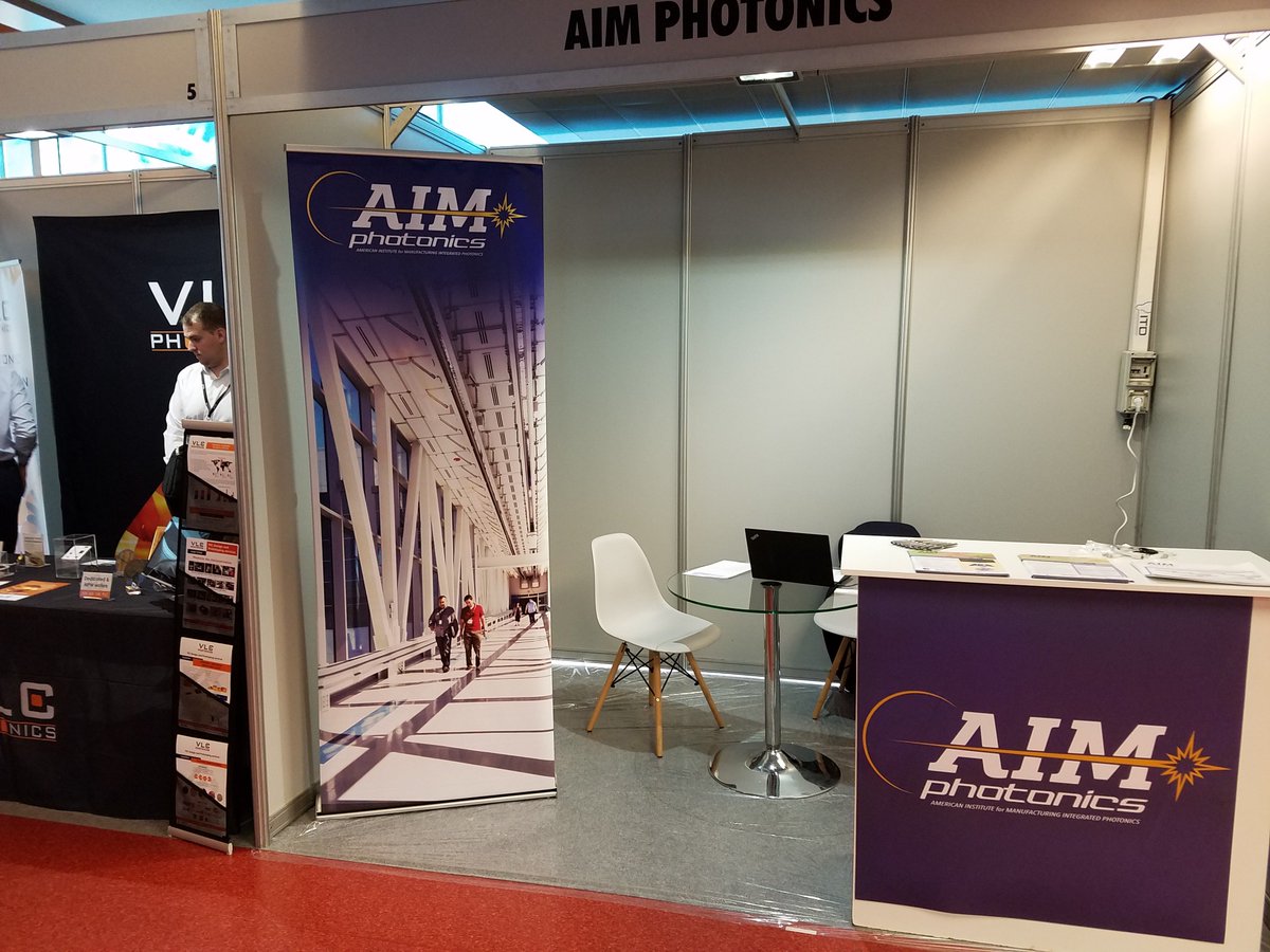 AIMPhotonics's tweet photo. We are at #ECIO2018!  Visit #AIMPhotonics booth to hear about the latest expansion added to our #IntegratedPhotonics #Ecosystem.  #photonics #siliconphotonics @MFGUSA @AIMPhotonics https://t.co/Z216Wfiav5