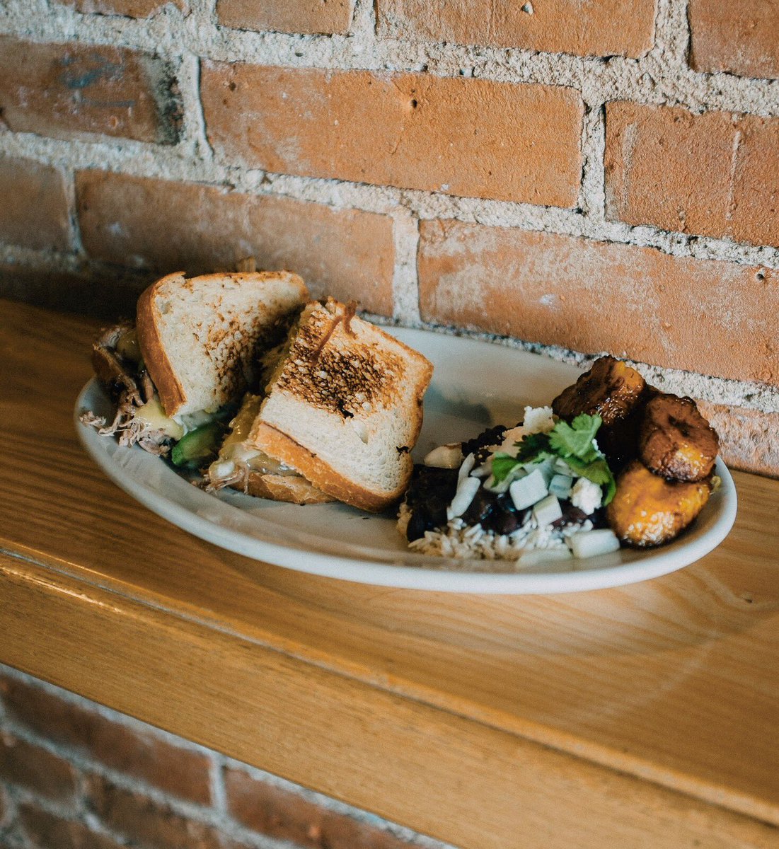 constantspring's tweet image. It’s Cuban Pork night dear friends! The classic returns. A Cuban-themed, slow-roasted pulled pork, topped with Swiss cheese, Mojonaise, and avocado. Served with rice, beans, and fried plantains. We open at 4:00. 🍽 #constantspringgoshen #ovalplatespecial