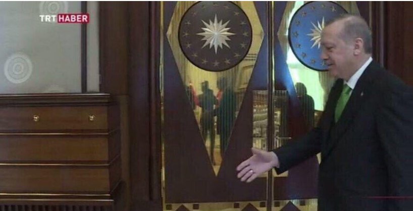 Erdogan is handshaking with his university friend