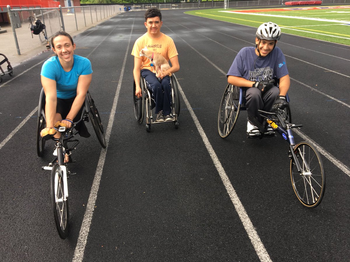 BoardmanTrackCC's tweet photo. Micah Beckwith getting some words of encouragement and some chair maintenance from former @OHSAASports State Champion Jenna Fesemyer and other Paralympic athletes prior to heading to Columbus tomorrow! https://t.co/wjYvpSoH8v