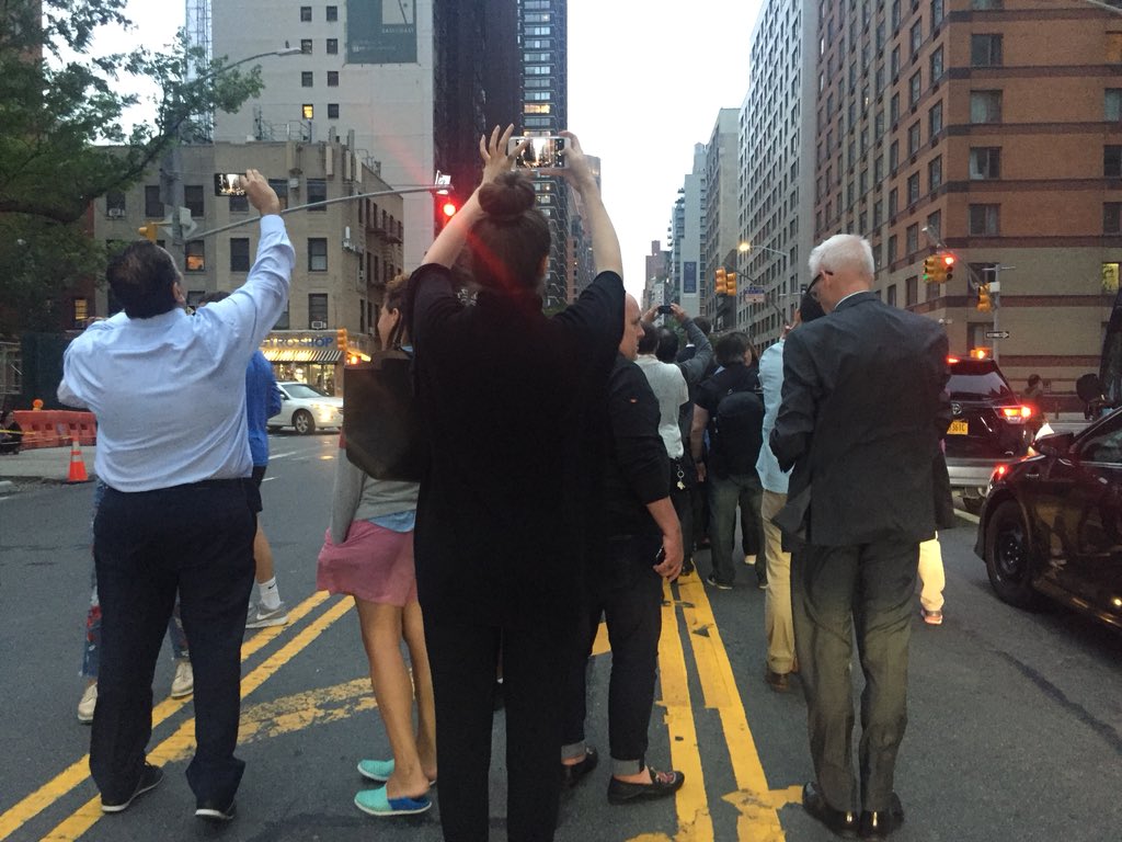 hello_mab's tweet photo. And to be honest, it was funnier taking pictures of the people taking pictures of #Manhattanhenge ! lol #nyc #ny #wearecrazyhere https://t.co/ukhtHs8Xay