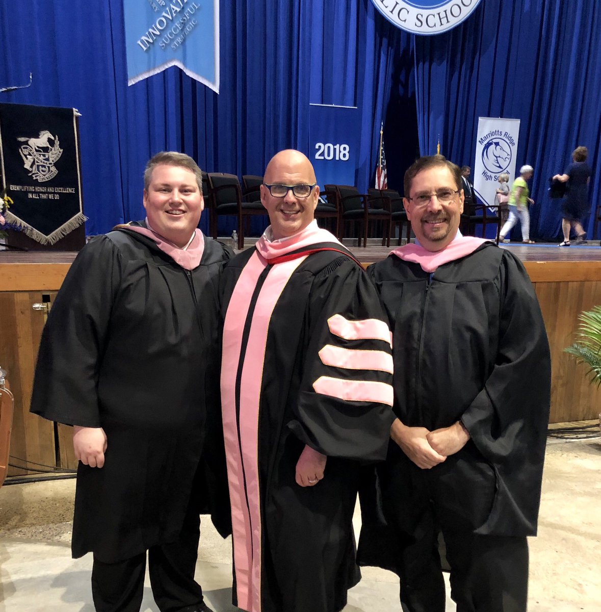 mrhschoirs's tweet photo. Your @hcpss_mrhs music directors at graduation! Power to the pink! #HCPSSLevelUp https://t.co/OKa4b8l35v