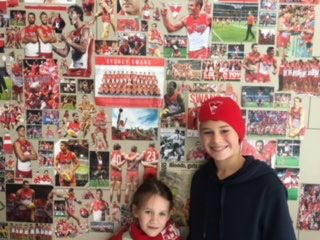 TonyHolt10's tweet photo. Couple of sick fans working at home https://t.co/9F9163j8uc @sydneyswans #redandwhitefriday https://t.co/Y9VuBt5fYP