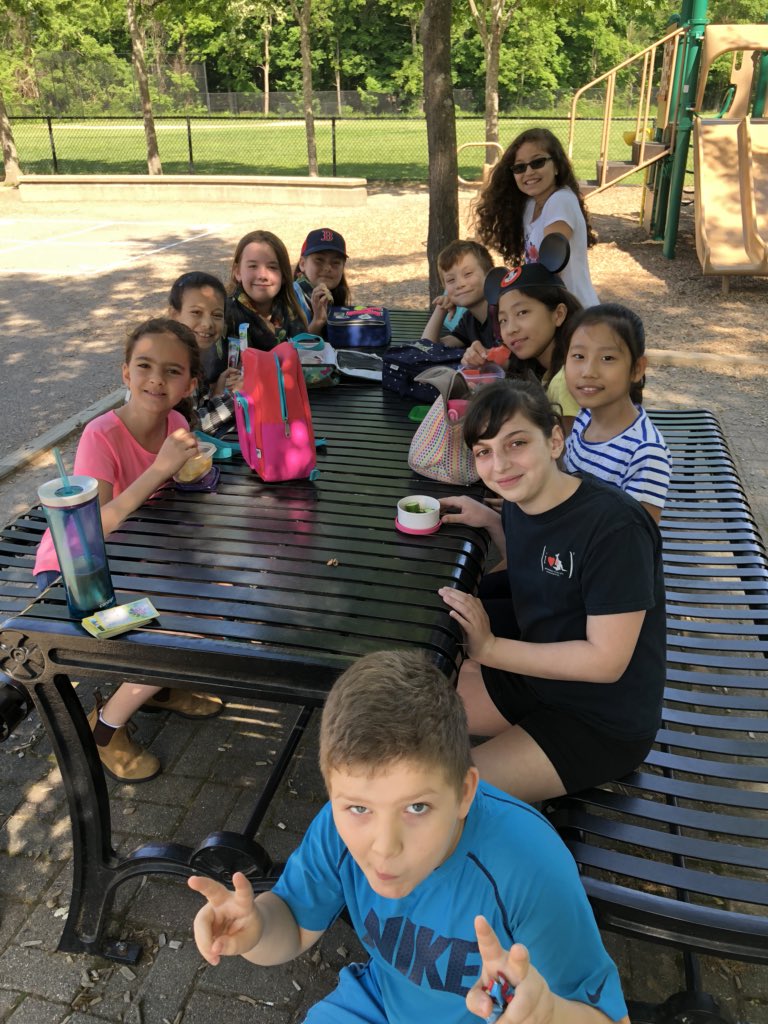 Enjoying some snack outside on Hat Day!