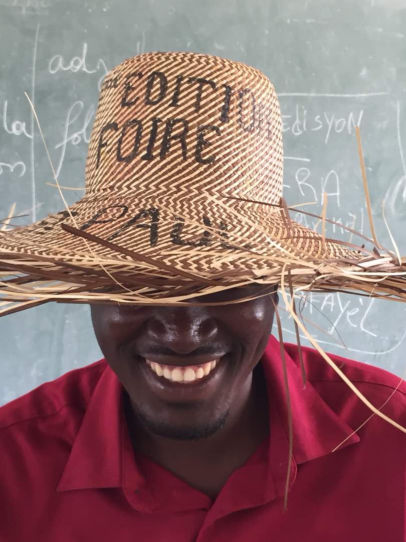COHaitiProject's tweet photo. St. Paul's School is gearing up for the 2nd annual Agricultural Festival tomorrow! The middle school faculty and students will celebrate by wearing these straw hats made by a family in Hacel. Stay tuned for more photos from the event! https://t.co/vK1x5dlNny