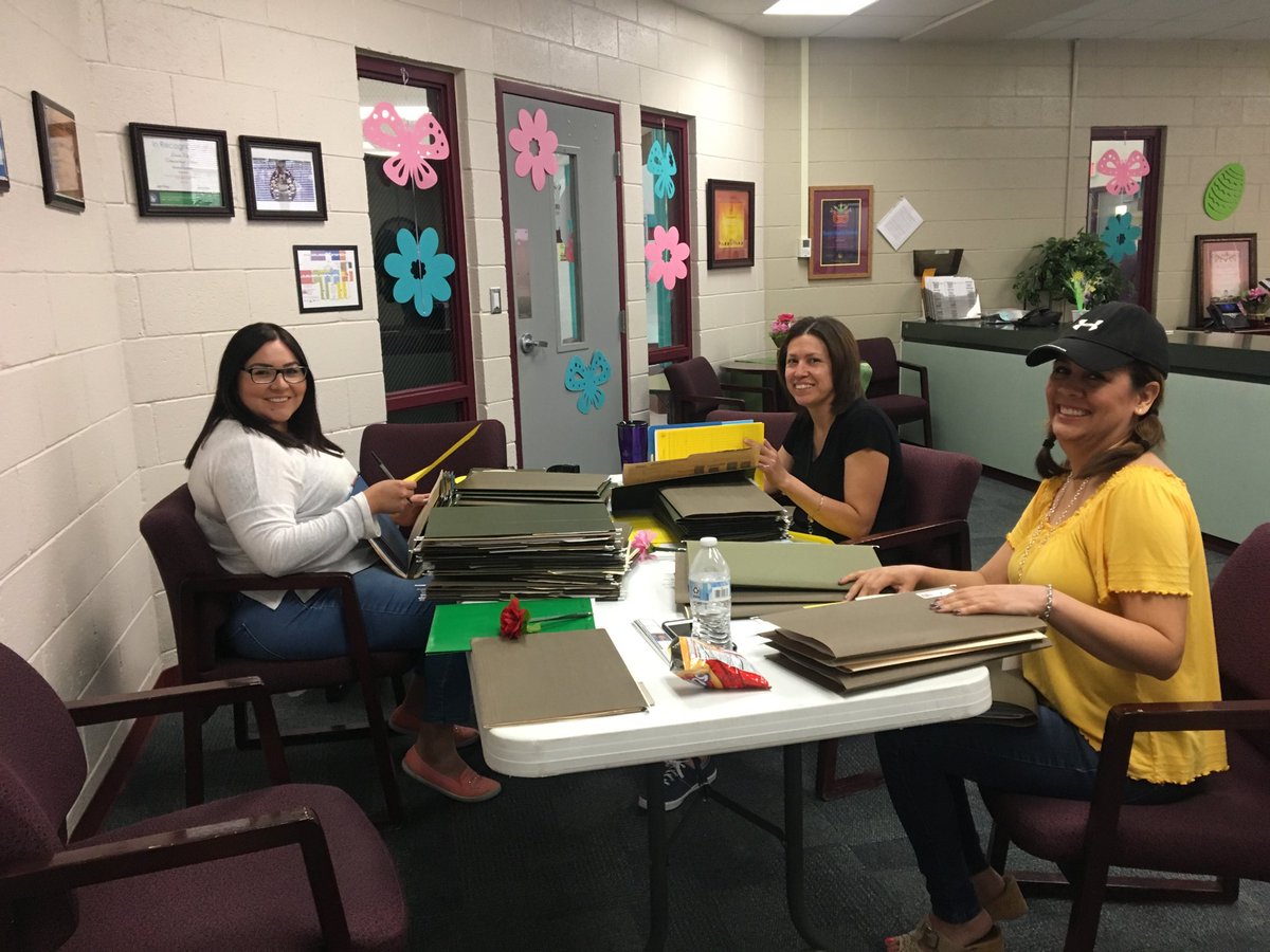 SShook_ES's tweet photo. Wrangler teachers completing paperwork for this wonderful school year.  #TeamSISD https://t.co/xe2paSf9jm