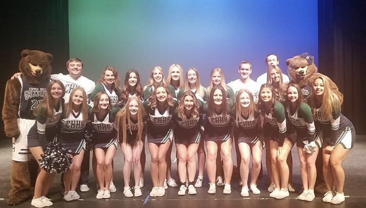 GrizzCheer's tweet photo. We are more than just a school we are a family! 
We love having our special education program at our goodbye assembly with us! We will miss you Mr. Quarnberg! Once a grizzly always a grizzly 💙💚 #chhscheer https://t.co/vf7bYMlz3W