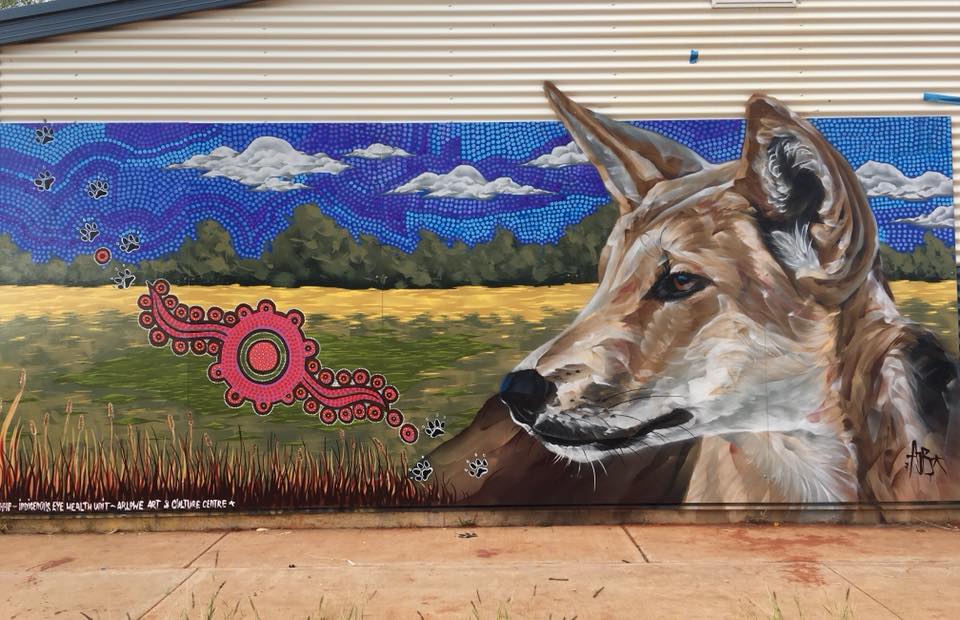 HlthEquityMDHS's tweet photo. In May @IEHU_UniMelb visited Alekarenge School in Ali Curung to talk about trachoma elimination and spread the #CleanFacesStrongEyes message. Our good friends @IndigHipHop also worked with students and artists to create two beautiful murals. See more here https://t.co/e96evpODqZ https://t.co/TFW9glwKz7