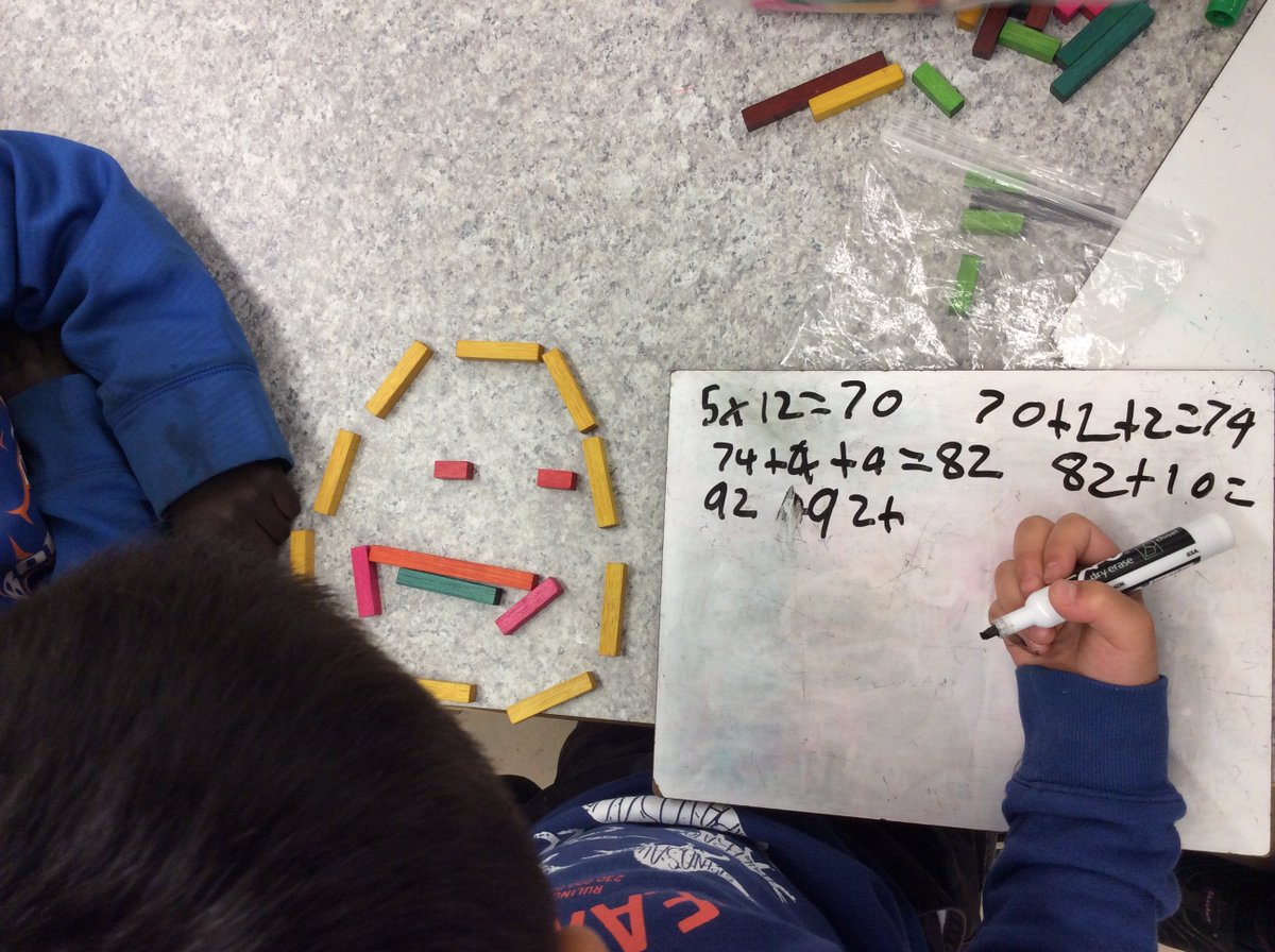 MPSgr1Harrison's tweet photo. Math Challenge today = Can you make a face using the cuisinaire rods so that the rods will have a sum of 100? https://t.co/wuLgvlnetA