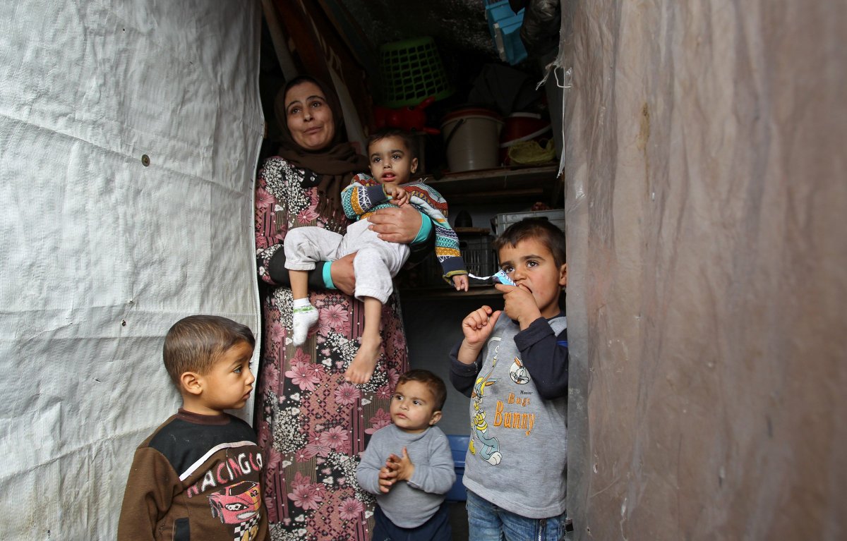 UNHCRLebanon's tweet photo. 58% of Syrian refugee families in Lebanon are ‘severely vulnerable’, living below the extreme poverty line of US$2.90 per day.

Most families are almost US$800 in debt. https://t.co/N8KCBJ2eCW