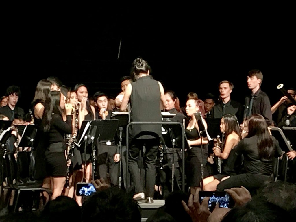 CBCLarsen's tweet photo. OK now I’ve seen everything. @vantechmusic Ms. Ip conducting Cheerio March (loud, uptempo, big tubas, kazoos!) with baton in one hand and sleeping baby in other. #motheroftheyear @VanTechMC https://t.co/eAEnkA3vwh