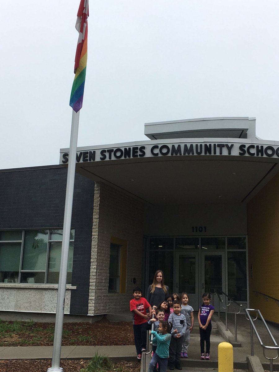 7StonesGSA's tweet photo. Rain makes rainbows 🌈 Perfect for celebrating #PrideMonth2018 Thank you to our band for your performance as we raised our flag! Watch for 8 different flags to be flown this month @7Stones_School https://t.co/QfkksahZZt