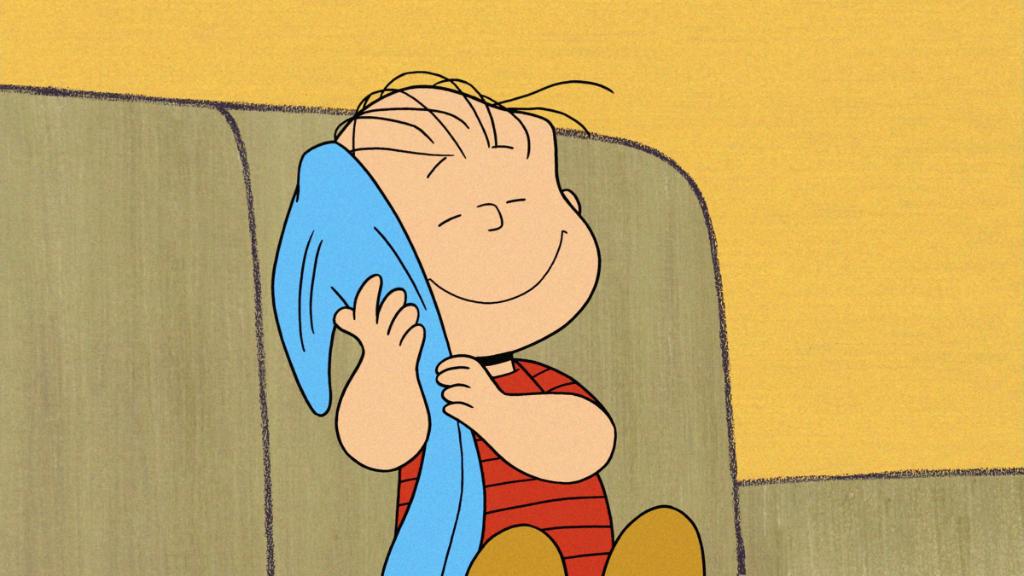 HISTORY's tweet photo. “This blanket is a necessity. It keeps me from cracking up. It may be regarded as a spiritual tourniquet. Without it, I'd be nothing, a ship without a rudder.” Linus Van Pelt.  Linus' famous security blanket made its debut on #ThisDayinHistory 1954. https://t.co/frjL28G3lX