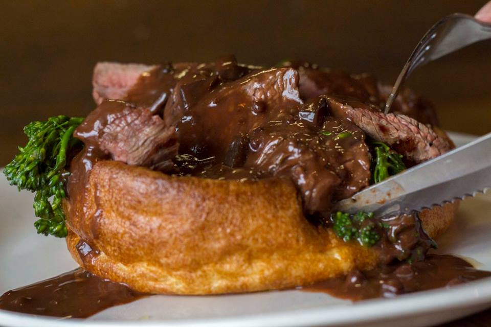 Have you tried our Texan Style Grilled Flank Steak yet? BIG yorkshire bowl filled / goat cheese, mashed potatoes or fries, grilled flank steak, berry / beet demi &amp; broccolini #steak #steaklover #yorkshire #texan #amazingfood #grilled #foodlover #delicious #meat #lunch #dinnernow