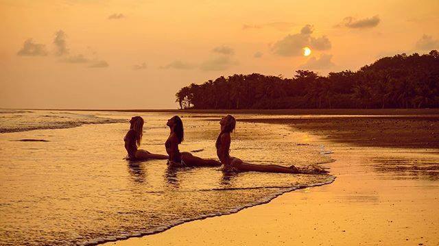 VCTourism's tweet photo. Yoga mermaids in paradise 🌺🌴 #Yoga #CostaRica #Sunset #BeachYoga #VistaCelestial https://t.co/zYvO9DEO3h