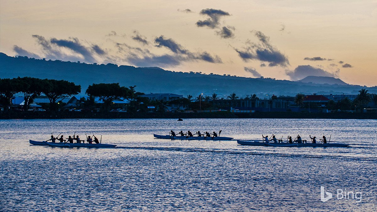 Canoes hurry across Apia Harbor at Apia, Samoa. http://msft.social/lPtYmz