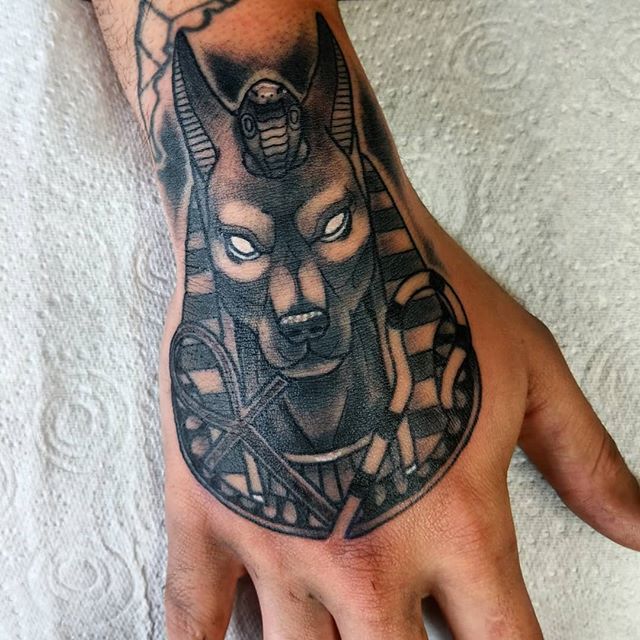 Ollie Keable Tattoos on X: "Anubis on Floriano's hand. Really enjoyed this, would love to tattoo more Egyptian gods! #tattoo #goodeggtattoos #eghamtattoo #anubis #anubistattoo #handtattoo #blackandgreytattoo #neotraditionaltattoo #traiditionaltattoo ...