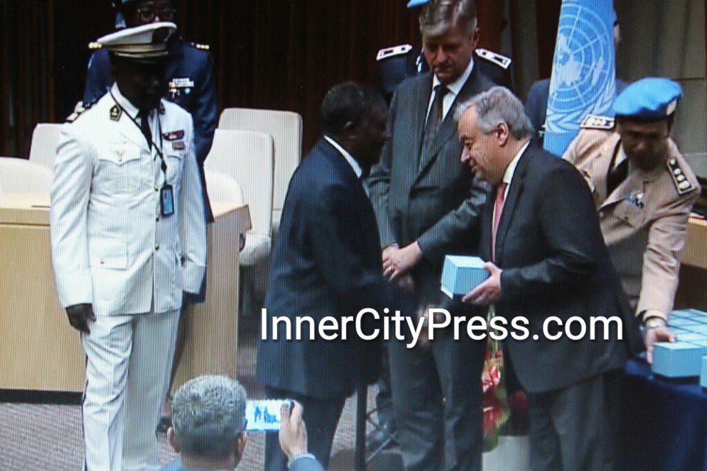 Here UNSG @AntonioGuterres at UN Peacekeepers' event with Ambassador of #Cameroon, whose troops are burning villages and killing civilians in the Anglophone zones. Inner City Press was banned from this event, while someone else is covering it with smart phone. #UN