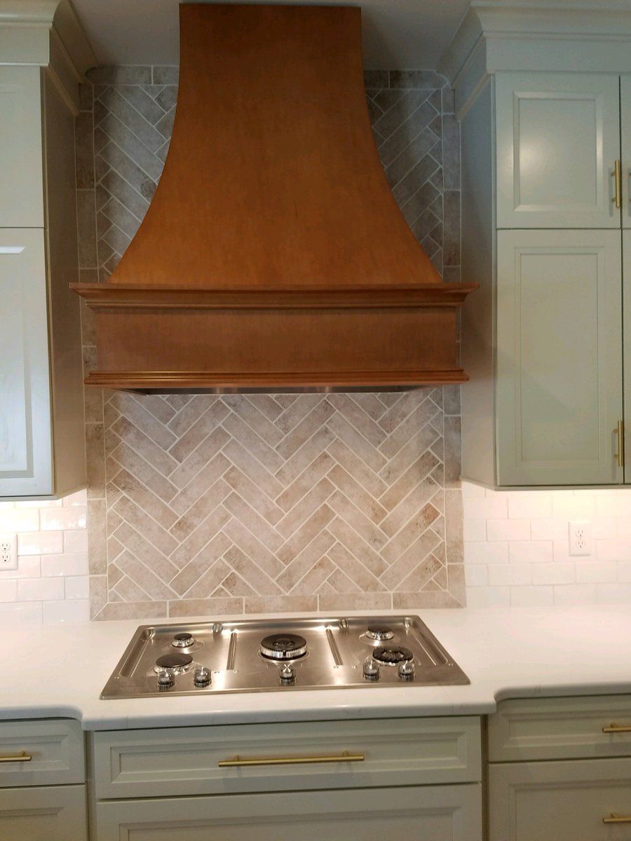 A peak at a #kitchenreno we wrapped up in #OrchardPark this week! Range hood is by <a href="/KraftMaid/">KraftMaid Cabinetry</a>