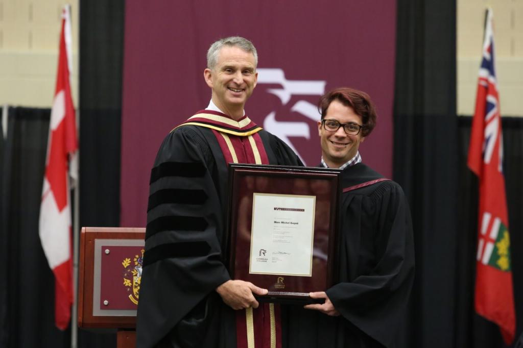 cambriancollege's tweet photo. Marc Gagne, Prez of Students Council receives Certificate of Recognition #cambriangrad https://t.co/O913zCkziB