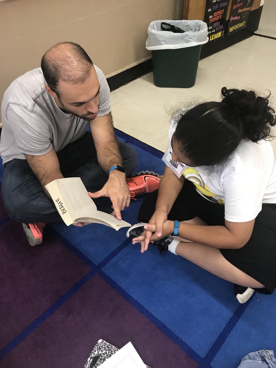Mr. Carola always motivating, assisting, and guiding his student.  #Reading #ps76learns
