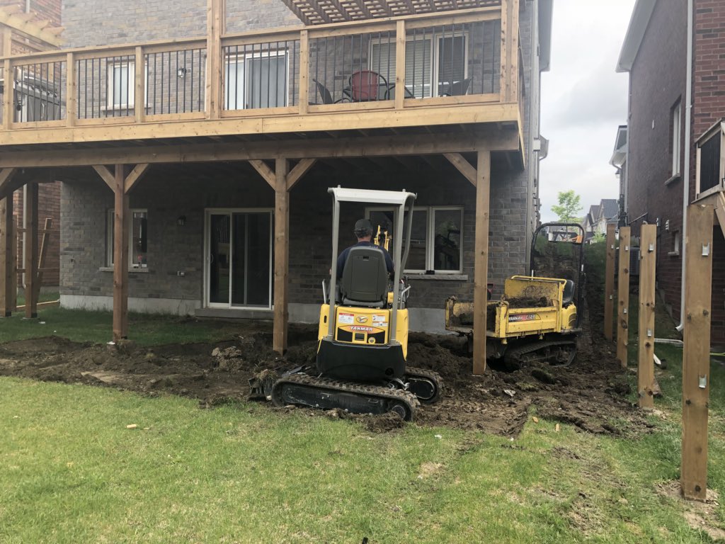 GoRedbeard's tweet image. Our small access machines getting another tight rear patio installed