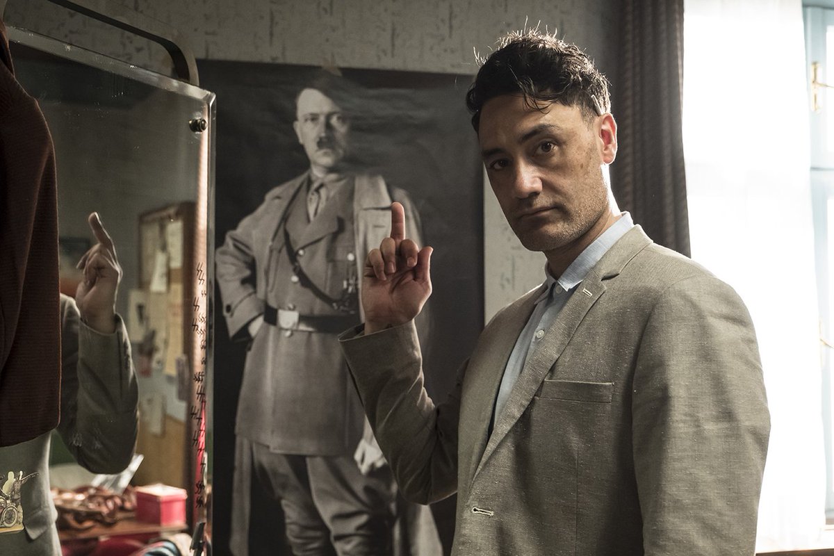 TaikaWaititi's tweet photo. Week one down of our anti-fuckface satire, Jojo Rabbit. Can't wait to share it with the world. Also, what better way to insult Hitler than having him portrayed by a Polynesian Jew? 
🖕 #FuckYouShitler @jojorabbitmovie @foxsearchlight https://t.co/bNZ2YlDgaF