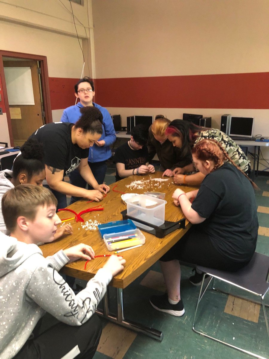Students and staff from the Anderson Crossing participating in team building activities together.