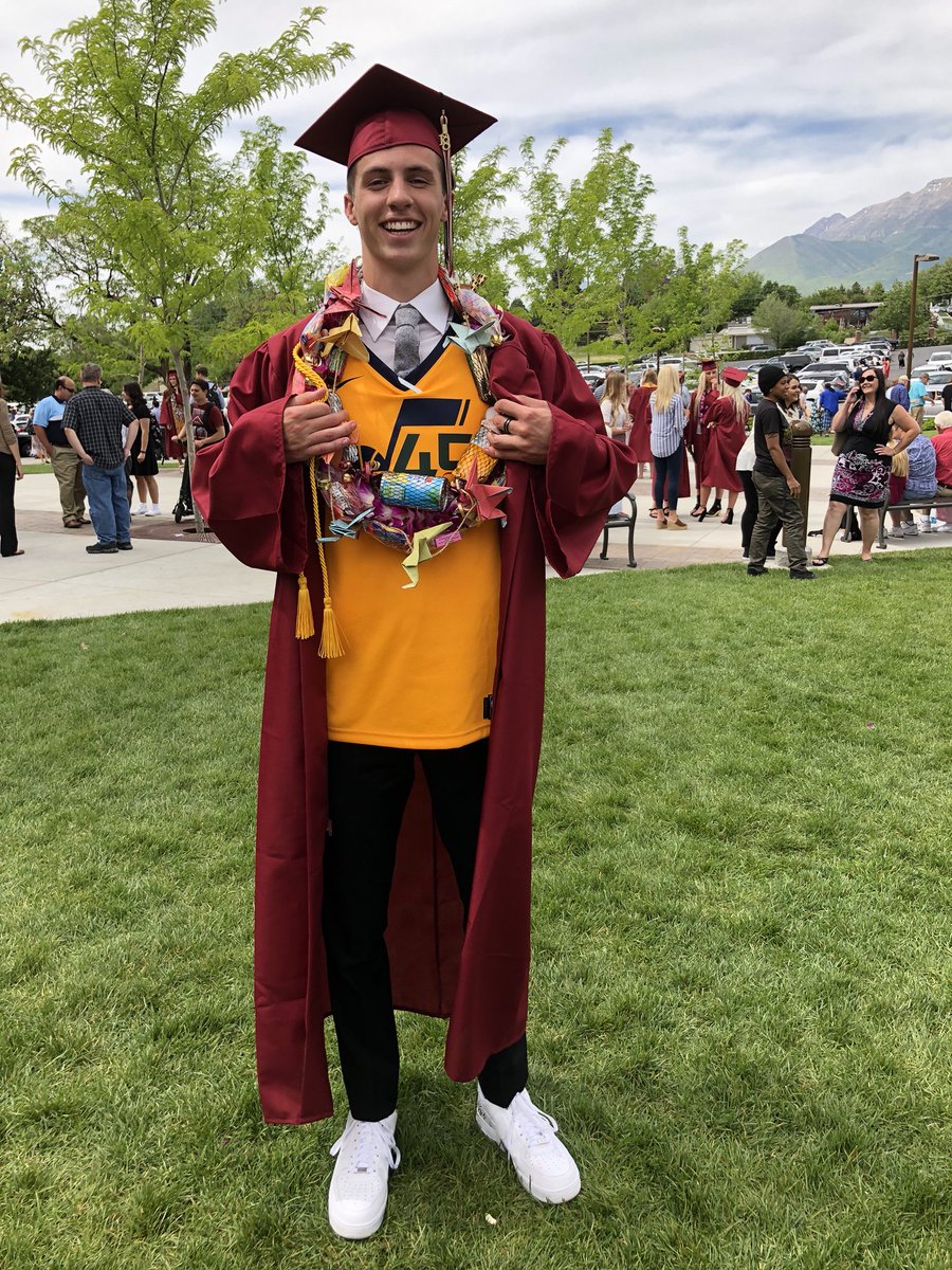 conjoman3's tweet photo. Had to show my graduation who the rookie of the year is! @spidadmitchell @utahjazz https://t.co/DV14PSLhGe