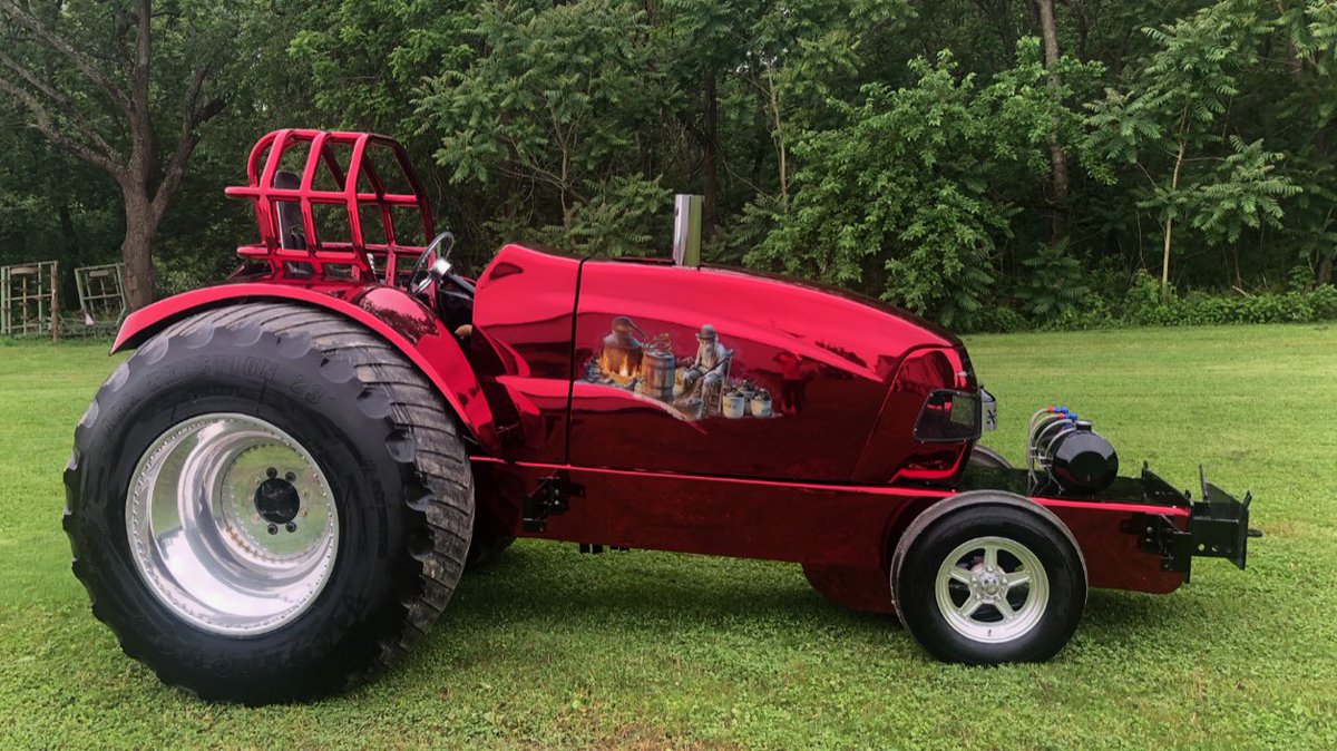 cosmichrome's tweet photo. The world’s most beautiful tractor. Red tinted Cosmichrome. #spraychrome #tractor #chrome https://t.co/txofkHQuK8
