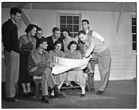 PSArchives's tweet photo. We've got our map and we're ready to go! In this 1949 image, a group of @univpugetsound students seem to be planning a road trip! 

This image features some prominent student musicians, so perhaps they were taking their act on the road! #archiveshashtagparty #ArchivesRoadTrip https://t.co/B3whddNoZQ