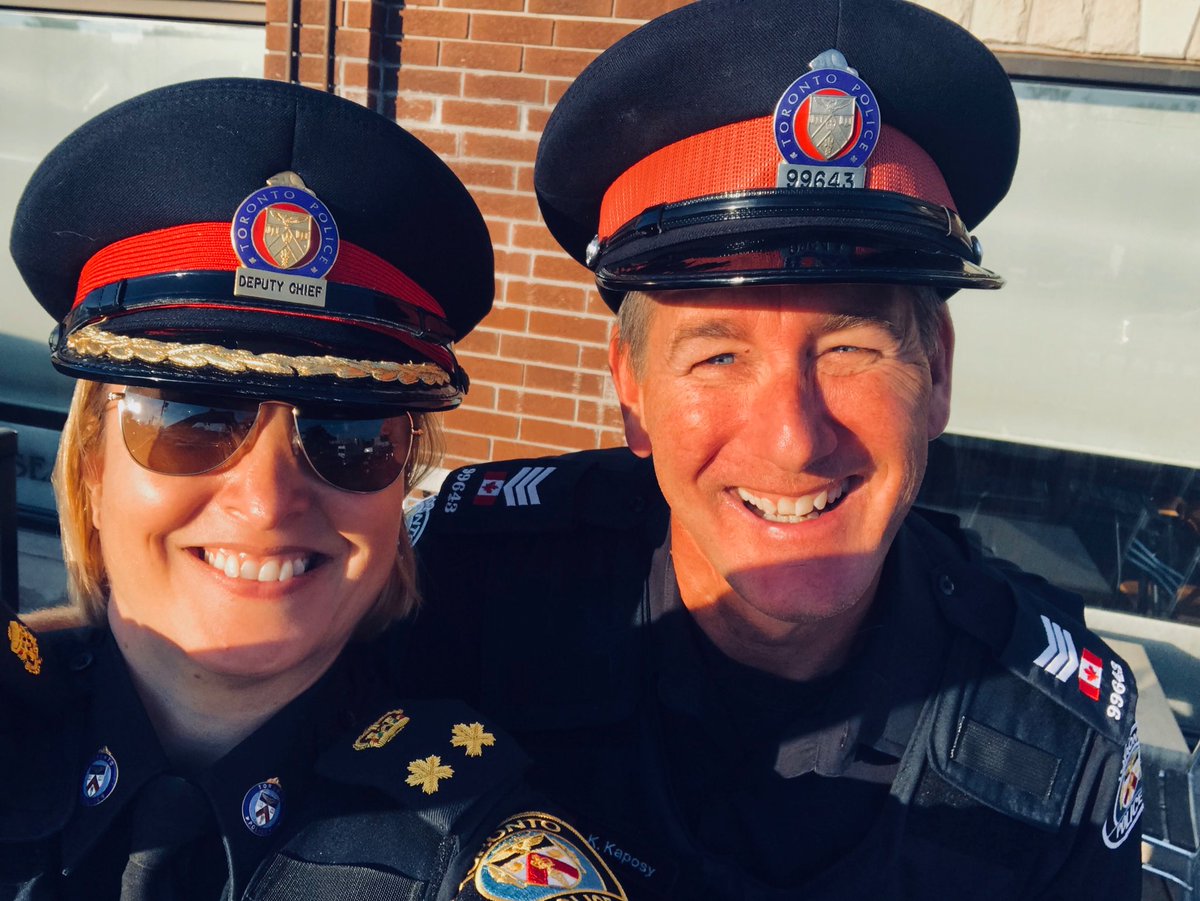 JustMeDarlaT's tweet photo. This pic personifies the definition of commitment/service to others...after a full day at the office, @TorontoPolice Deputy @ShawnaCoxon is doing a night shift ride-along with @TPS12Div Sgt Kevin Kaposy-who just returned from a year long peacekeeping mission in the Ukraine https://t.co/tViO4tl32R