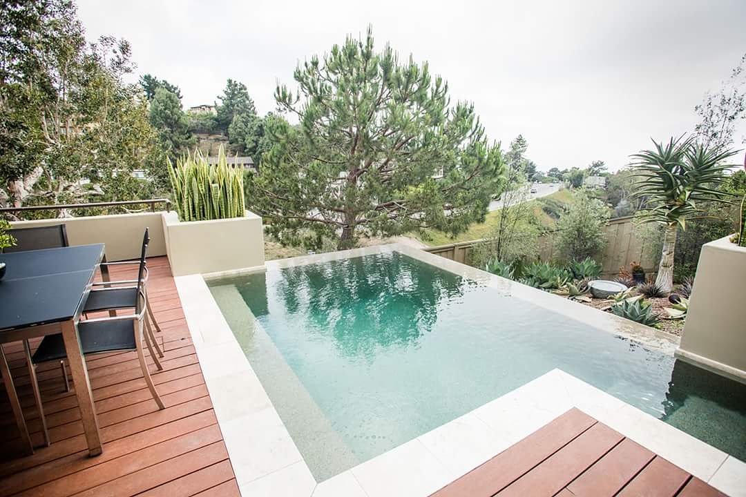 Sharp design and beautiful reflection ... check and check! questarpools.com #beautiful #amazing #awesome #luxurypools #PoolDesign #swdmasters #water #art #California #swimmingpool