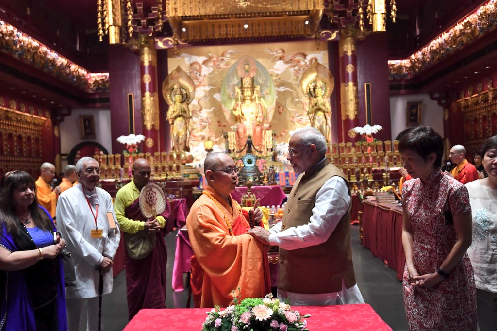 narendramodi's tweet photo. Glimpses from the memorable visit to the Buddha Tooth Relic Temple and Museum. https://t.co/EBf2yAuOwn