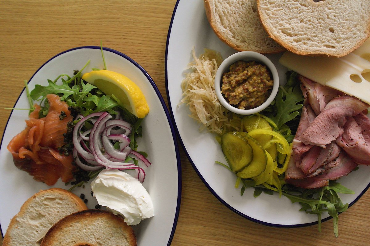 Our open bagels make the perfect brunch, lunch or light dinner 😋 Choose from homemade pastrami, rocket, emmental and homemade sauerkraut &amp; buttercrunch pickles OR Richard’s smoked salmon, cream cheese, rocket and fried capers #bagels #lunch #pastrami #newyorkstyle #deli