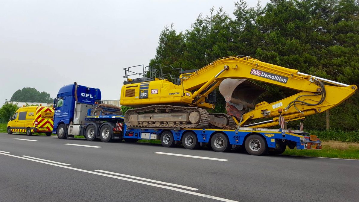 The return of an excavator from a demolition job in France.