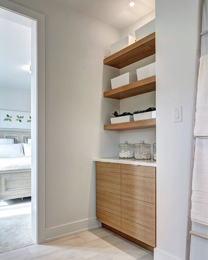 Custom open shelving &amp; built in storage make for the perfect ensuite.