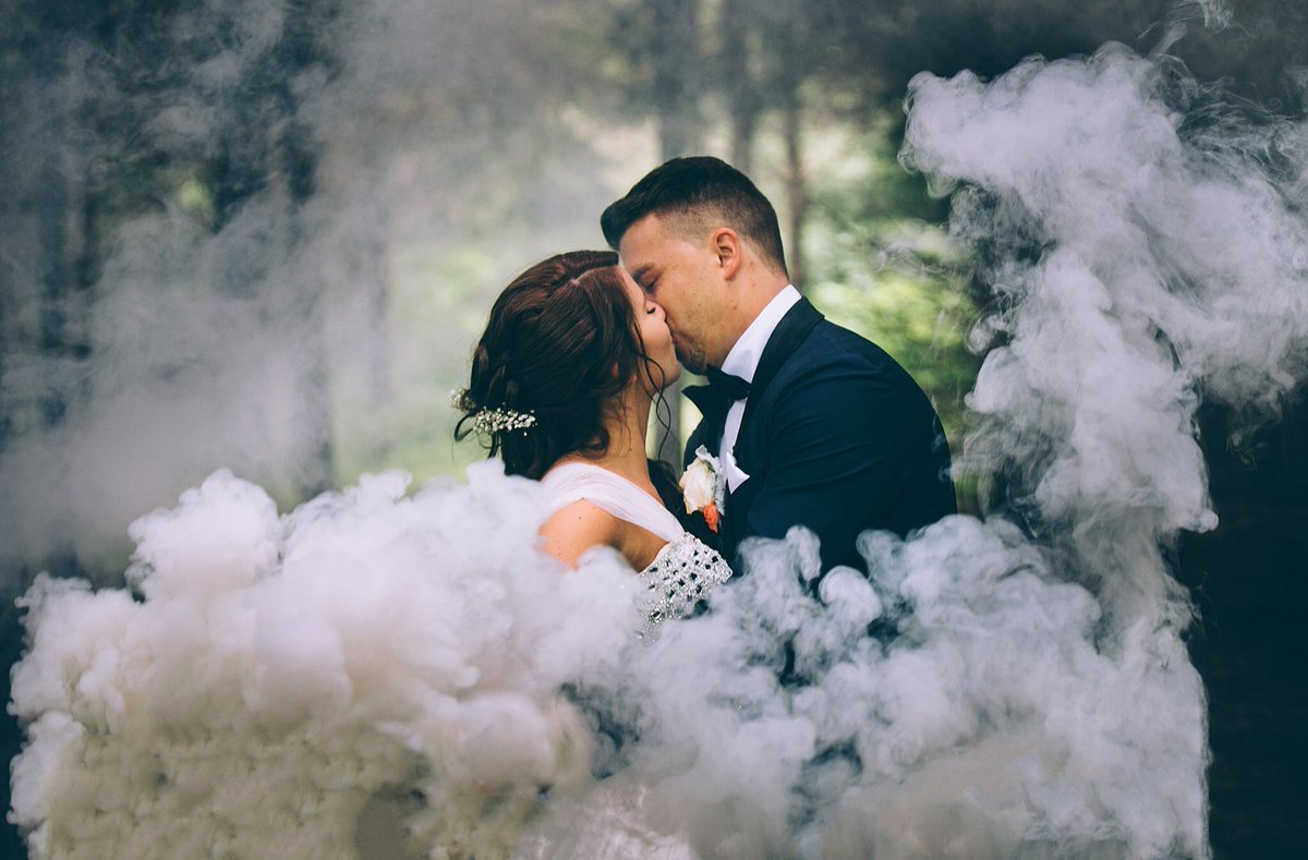 CulinaryCaters's tweet photo. With wedding photos becoming less traditional and more unique and creative, photographers are adding new elements to their look. Smoke can be used to create a fun or intimate ambiance for your background.

beautiful photos care of Red Button Photography.  @EPWELndont https://t.co/EDXxYqxF9g